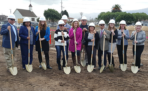 Group of people with shovel