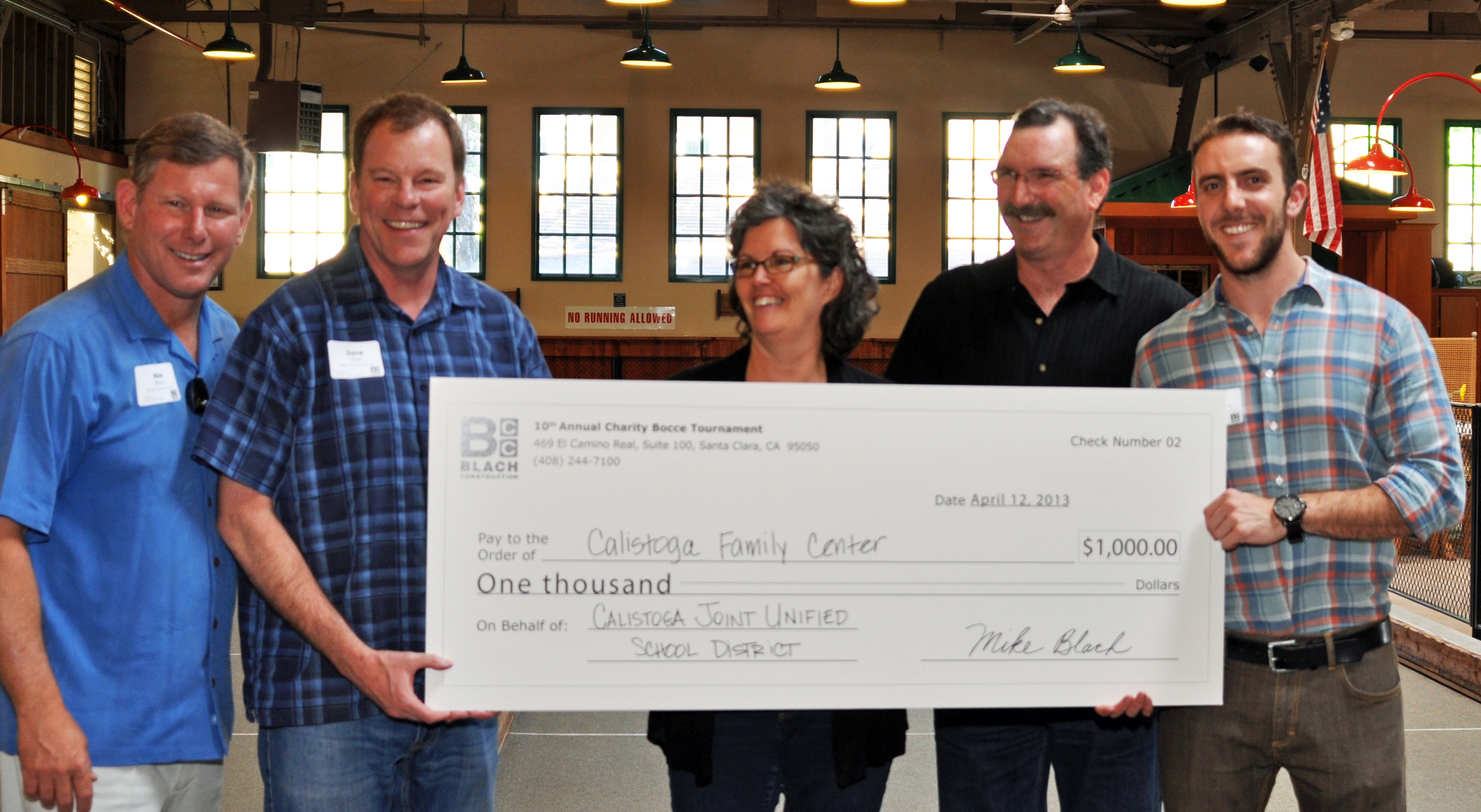 Charity Bocce Ball Tournament Mike Blach, Dave Finn, Teri and Matthew Malvino and Brian Azzopardi Presenting Check